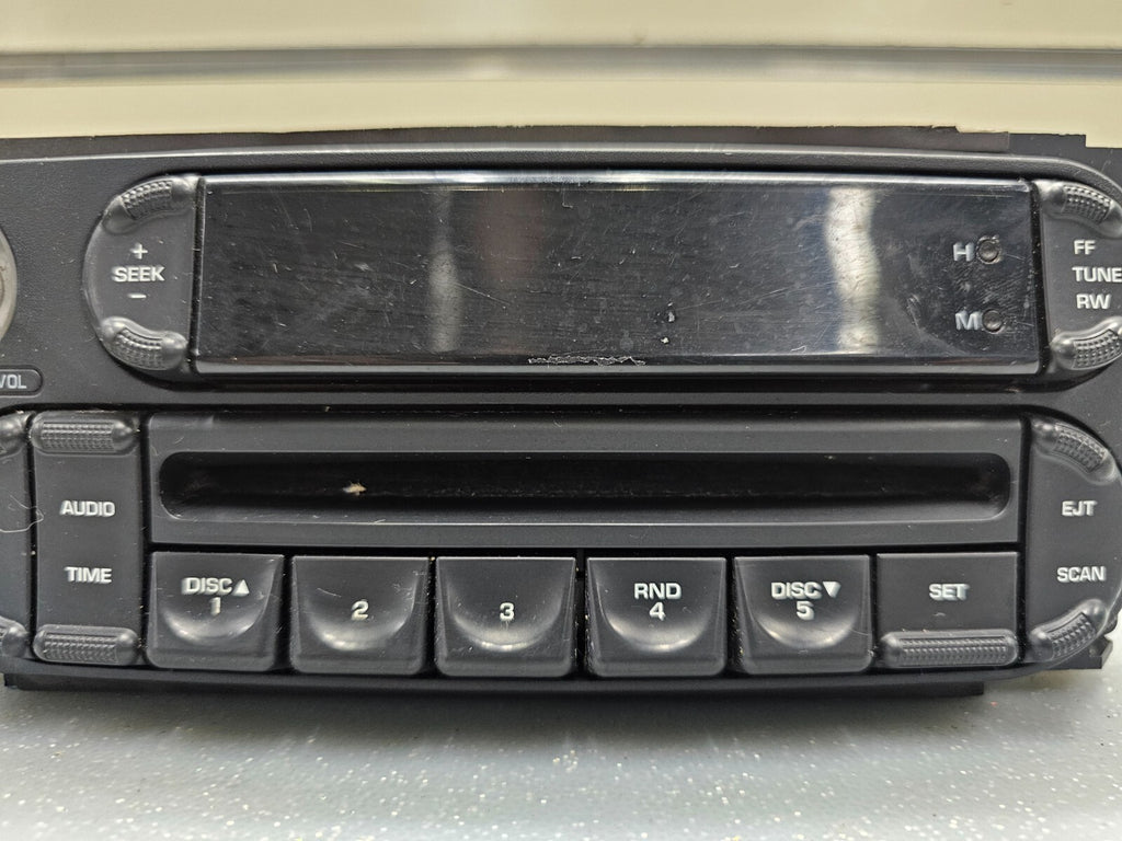 🔥02-07 Caravan Sebring Ram Liberty Dash AM/FM Radio CD Player Stereo Display