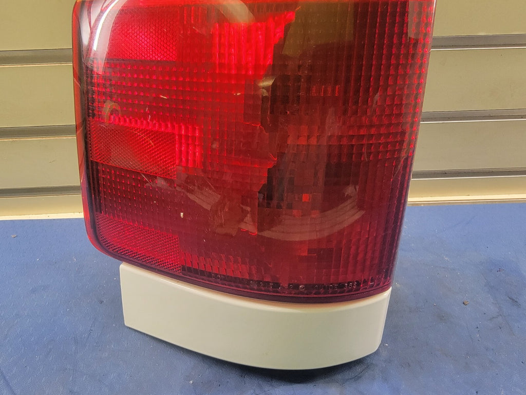 2002-2009 GMC Envoy Tail Light Bezel Assembly Chrome left driver Side