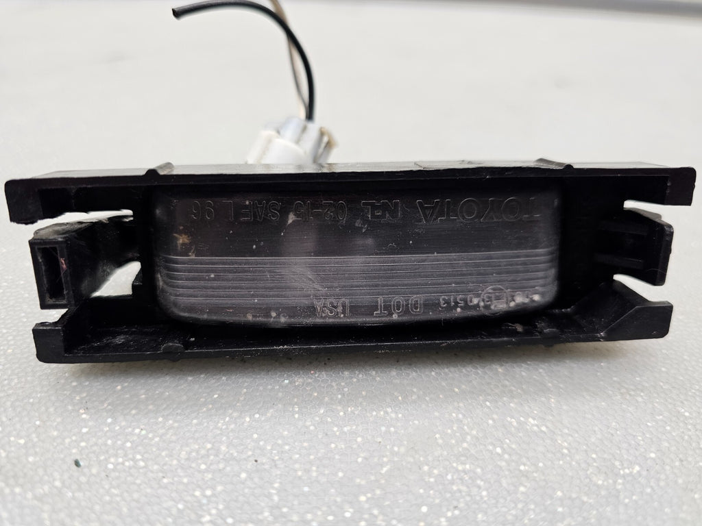 1998-2002 TOYOTA COROLLA LICENSE PLATE LIGHT LH DRIVER OEM/TC