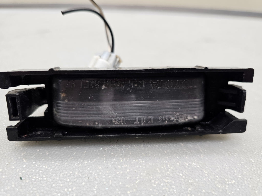 1998-2002 TOYOTA COROLLA LICENSE PLATE LIGHT LH DRIVER OEM/TC