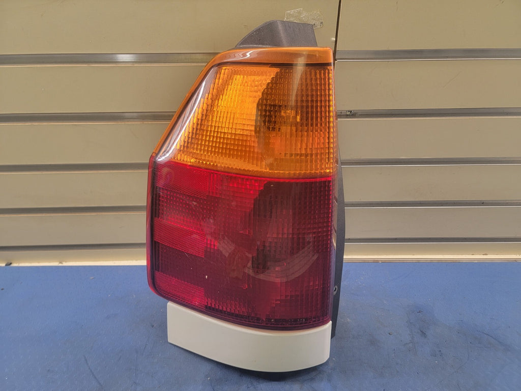 2002-2009 GMC Envoy Tail Light Bezel Assembly Chrome left driver Side
