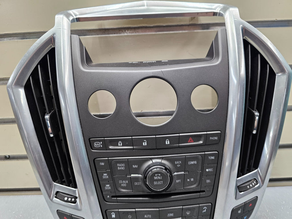 10-12 CADILLAC SRX CENTER DASH RADIO CLIMATE CONTROL SURROUND BEZEL PANEL SILVER