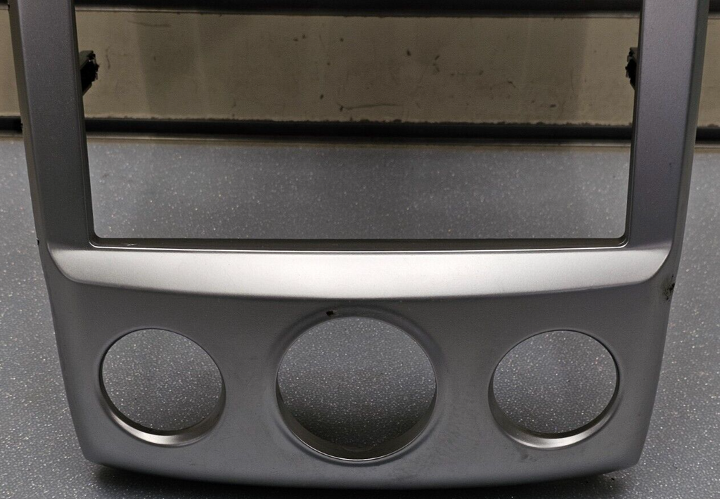 05-09 SPORTAGE CENTER DASH RADIO STEREO BEZEL TRIM PANEL CLIMATE CONTROL SILVER
