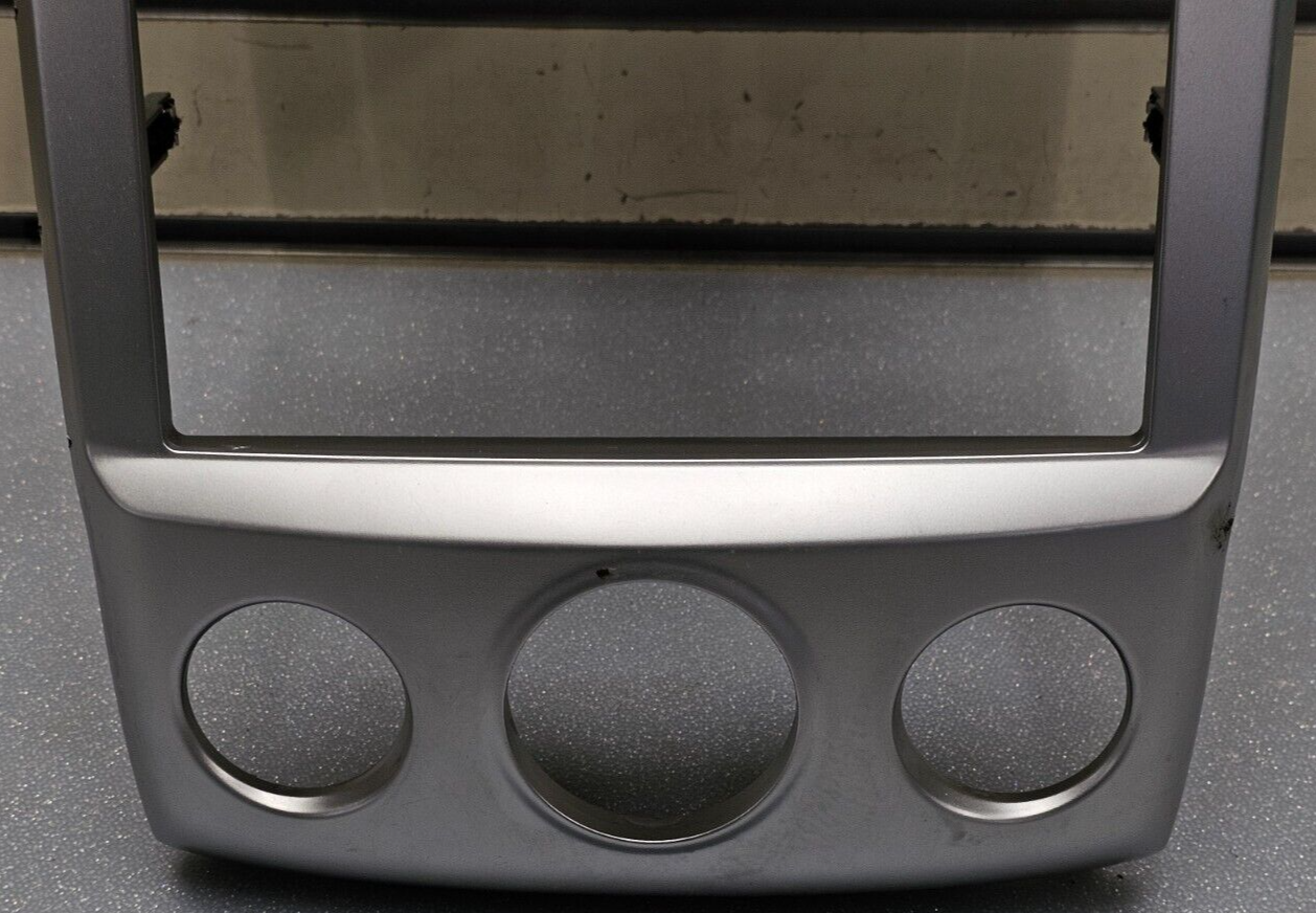 05-09 SPORTAGE CENTER DASH RADIO STEREO BEZEL TRIM PANEL CLIMATE CONTROL SILVER