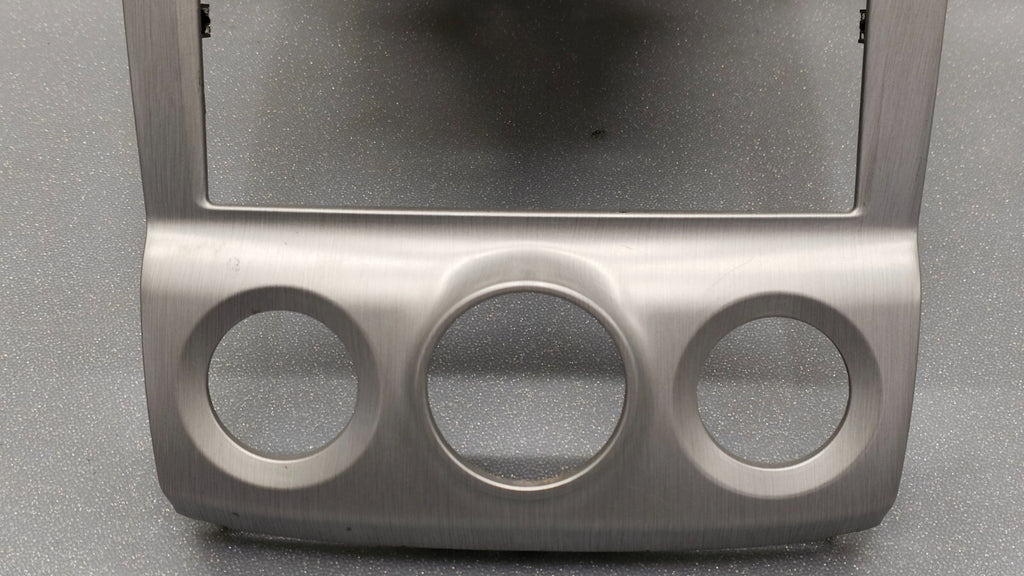 05-09 SPORTAGE CENTER DASH RADIO STEREO BEZEL TRIM PANEL CLIMATE CONTROL SILVER