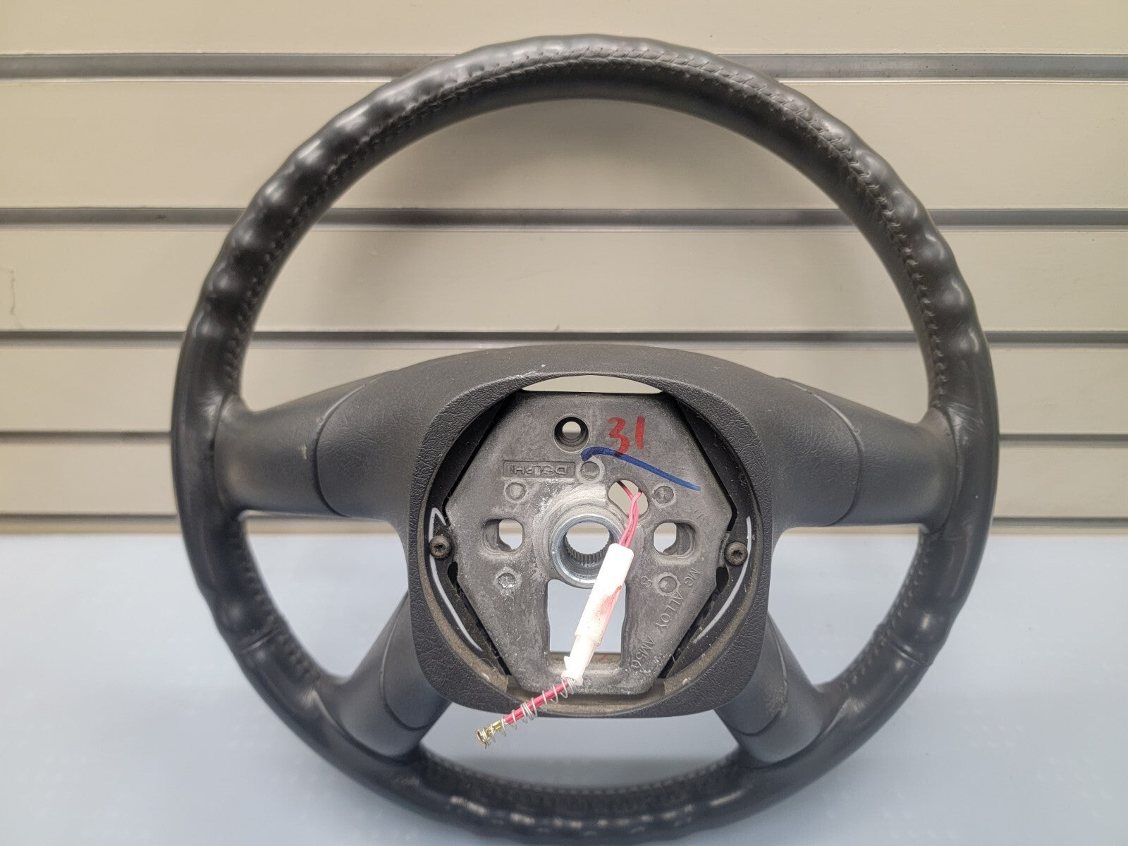 02-09 Trailblazer Envoy03-06 SILVERADO SIERRA YUKON STEERING WHEEL LEATHER BLACK