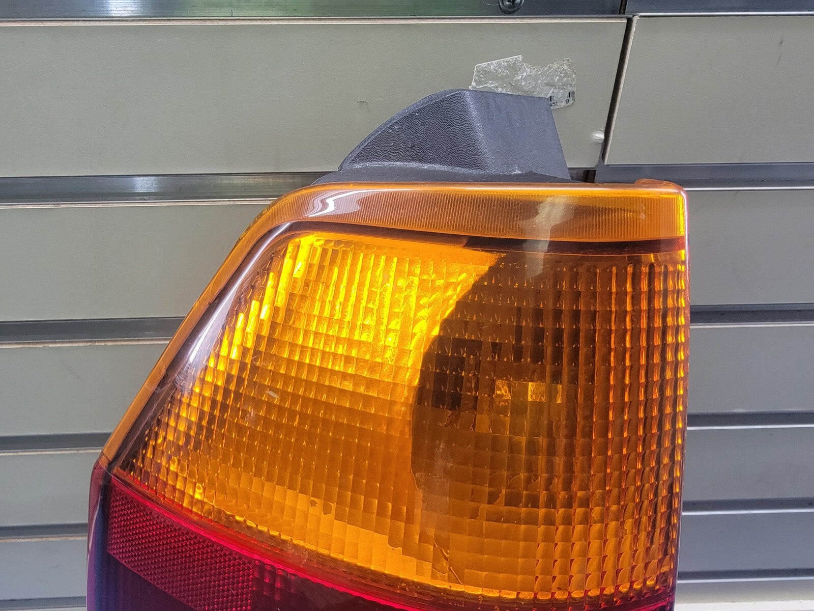 2002-2009 GMC Envoy Tail Light Bezel Assembly Chrome left driver Side