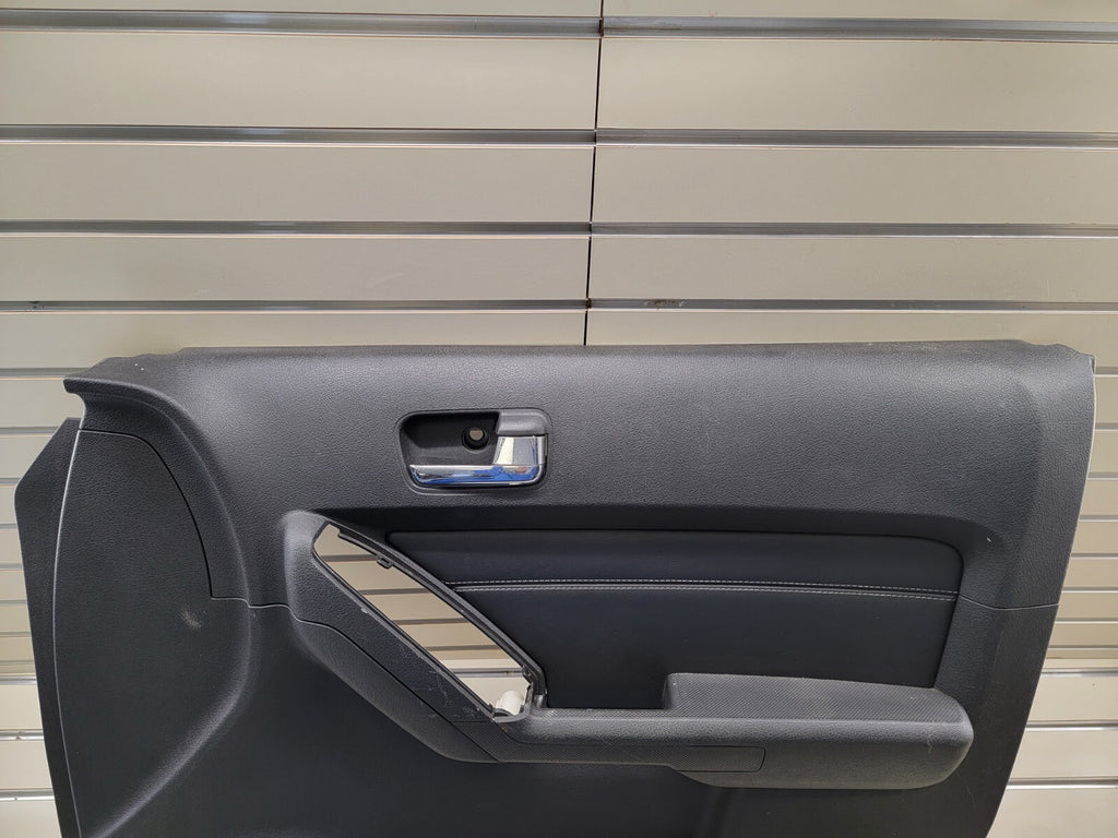 06-10 HUMMER H3 PASSENGER RIGHT FRONT DOOR TRIM PANEL black OEM