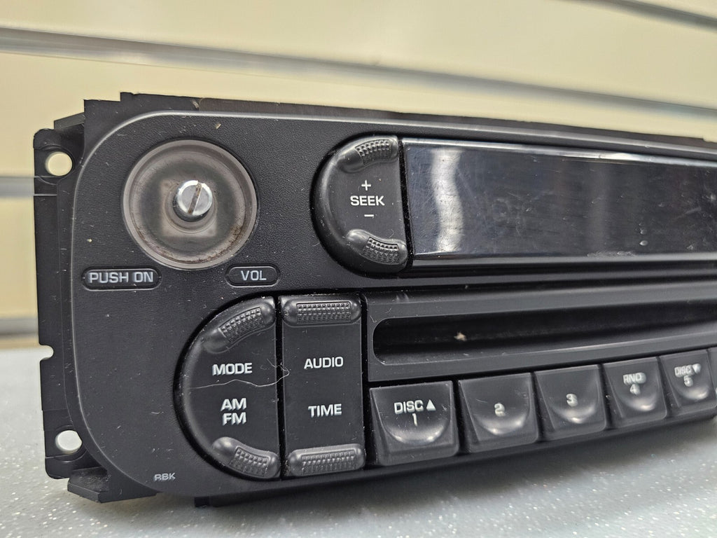 🔥02-07 Caravan Sebring Ram Liberty Dash AM/FM Radio CD Player Stereo Display