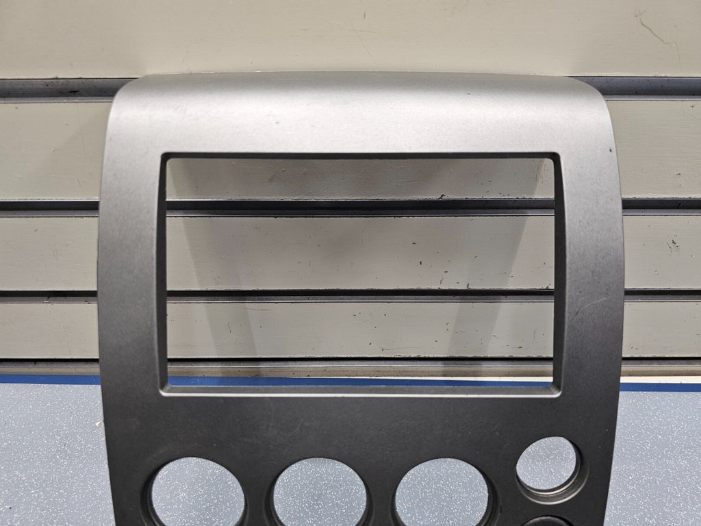 🔥04-07 NISSAN ARMADA STEREO RADIO DASH SURROUND PANEL TRIM BEZEL GREY