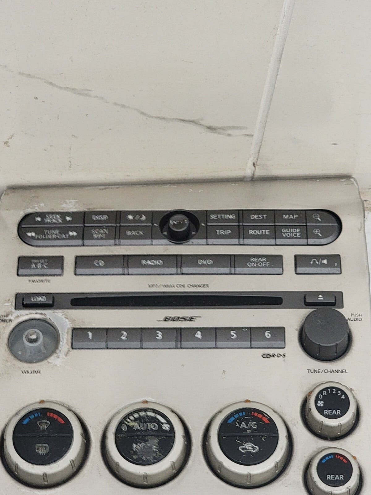 04-07 Infiniti QX56 Dash Climate Control Radio Stereo Display Bose Bezel LT Tan