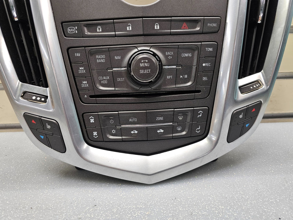 10-12 CADILLAC SRX CENTER DASH RADIO CLIMATE CONTROL SURROUND BEZEL PANEL SILVER