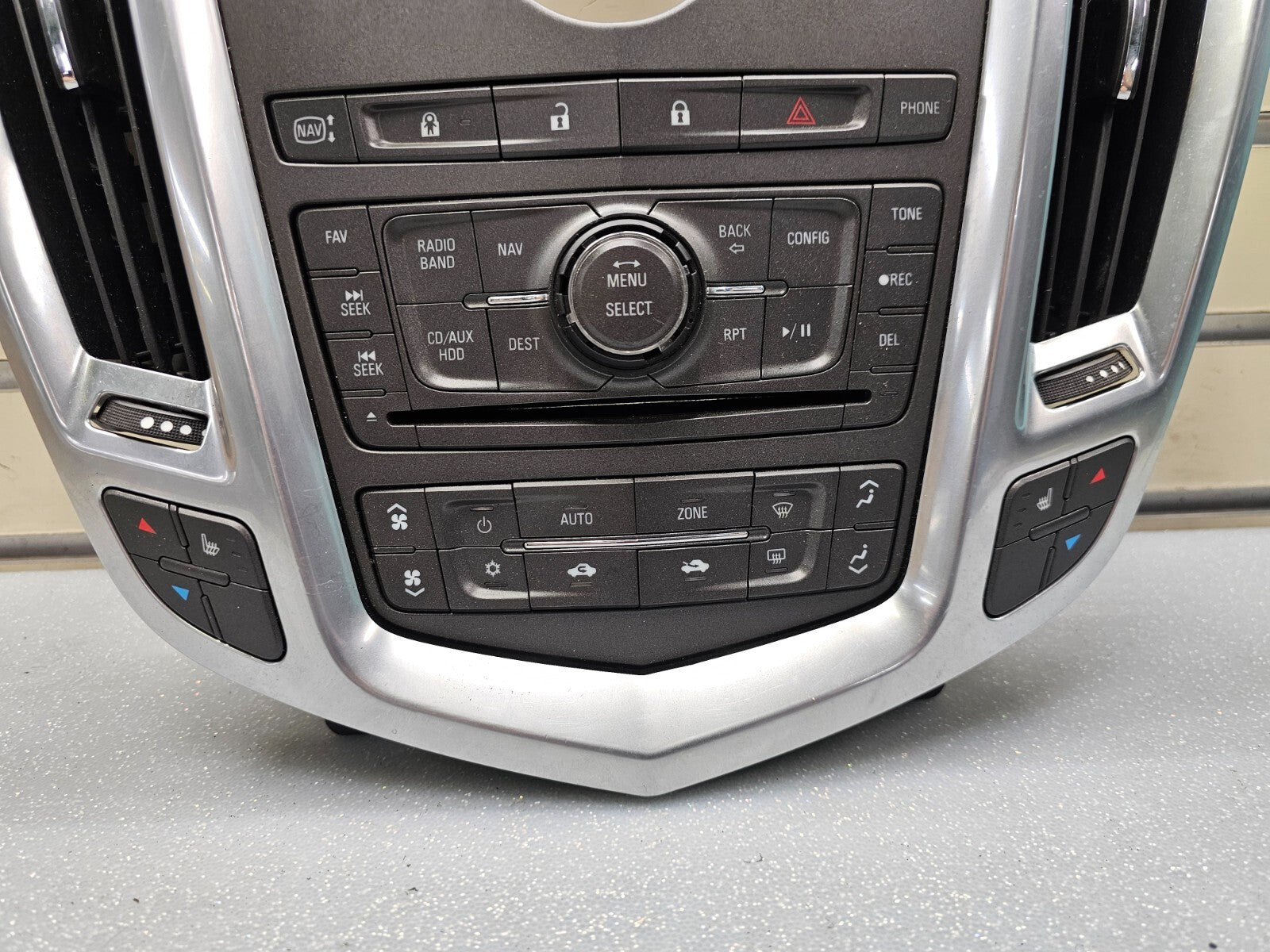 10-12 CADILLAC SRX CENTER DASH RADIO CLIMATE CONTROL SURROUND BEZEL PANEL SILVER