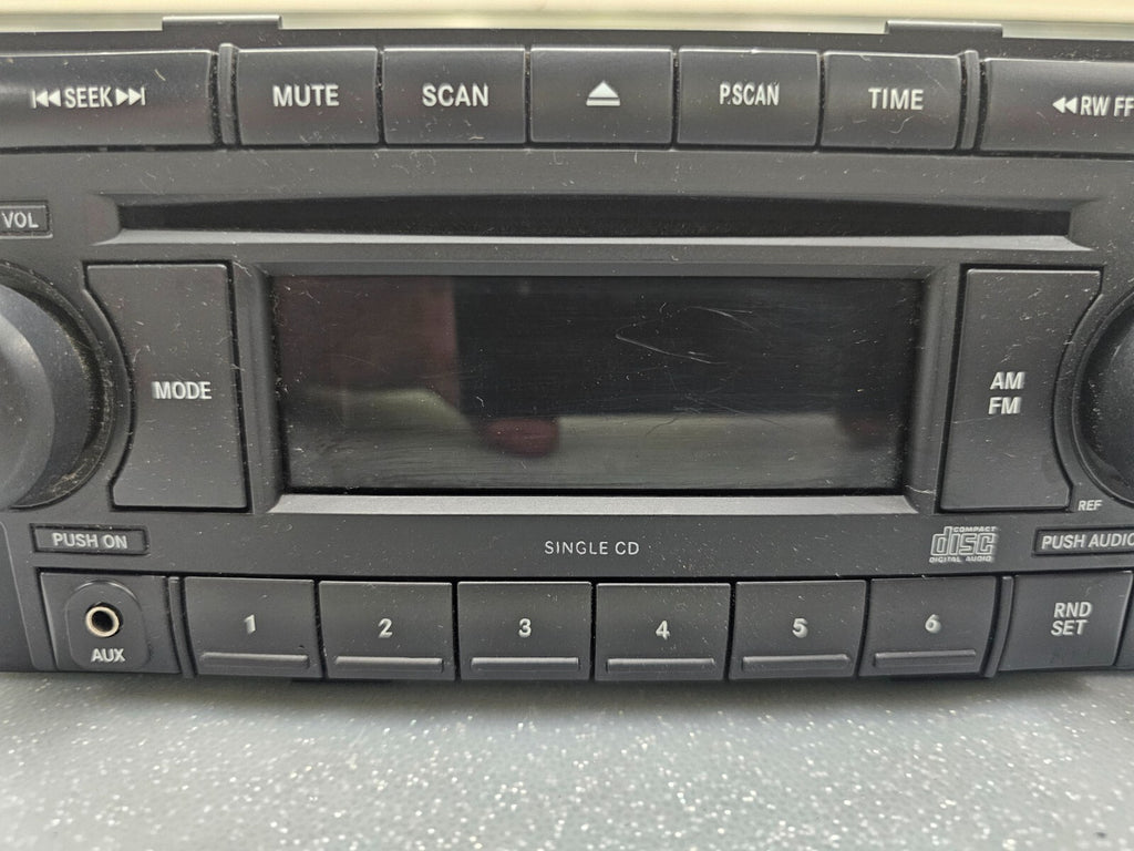 🔥04-10 Jeep Dodge Chrysler Front Dash Radio AM FM CD Player Aux Input Receiver
